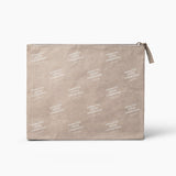 Beige makeup pouch with white text pattern on a white background